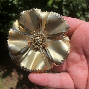 Oversized gold flower brooch